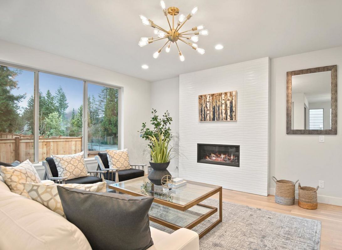 Living Room with a built-in fireplace. Plan JD-23802-2-4