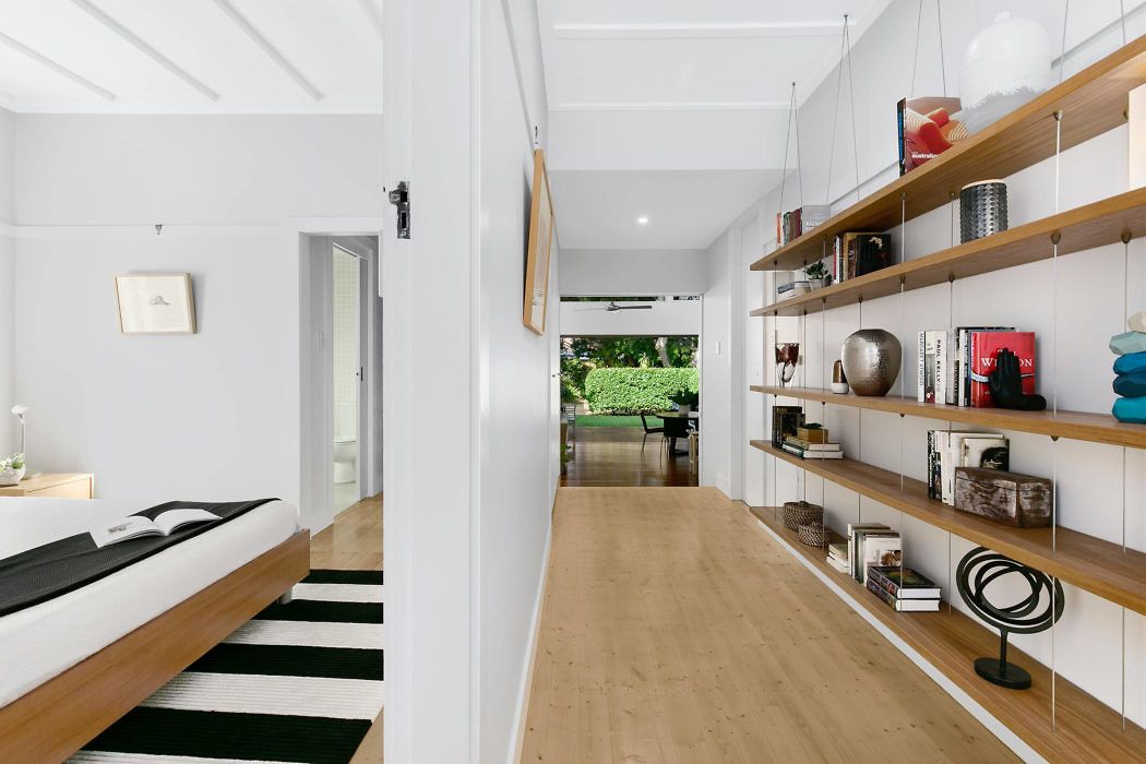 A corridor with open bookshelves