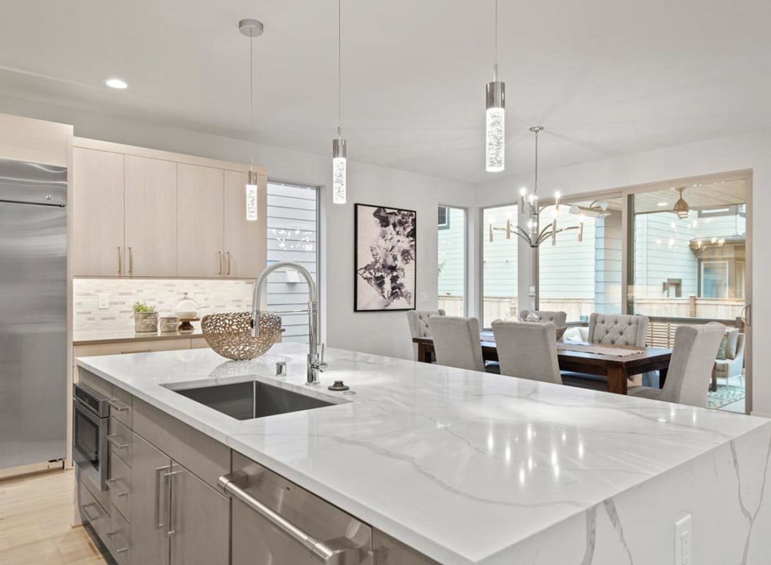 View of the dining room from the kitchen. Plan JD-23802-2-4