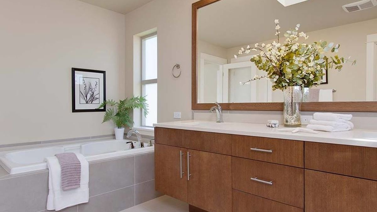 Modern master bathroom Bathtub located at window