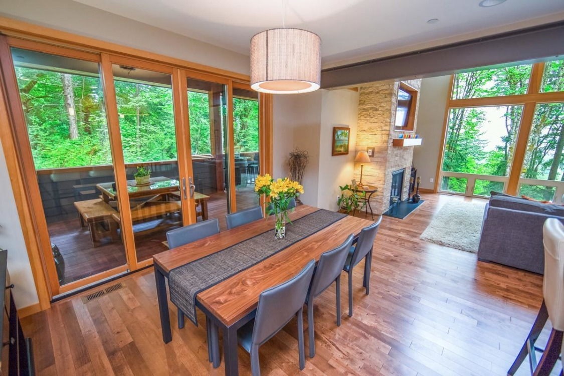 The dining room with a covered deck view.