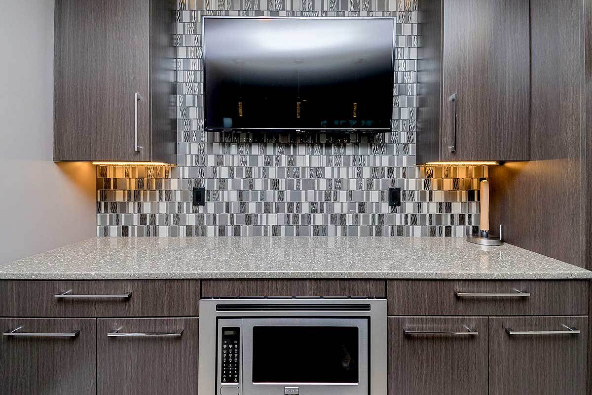 TV on the kitchen wall