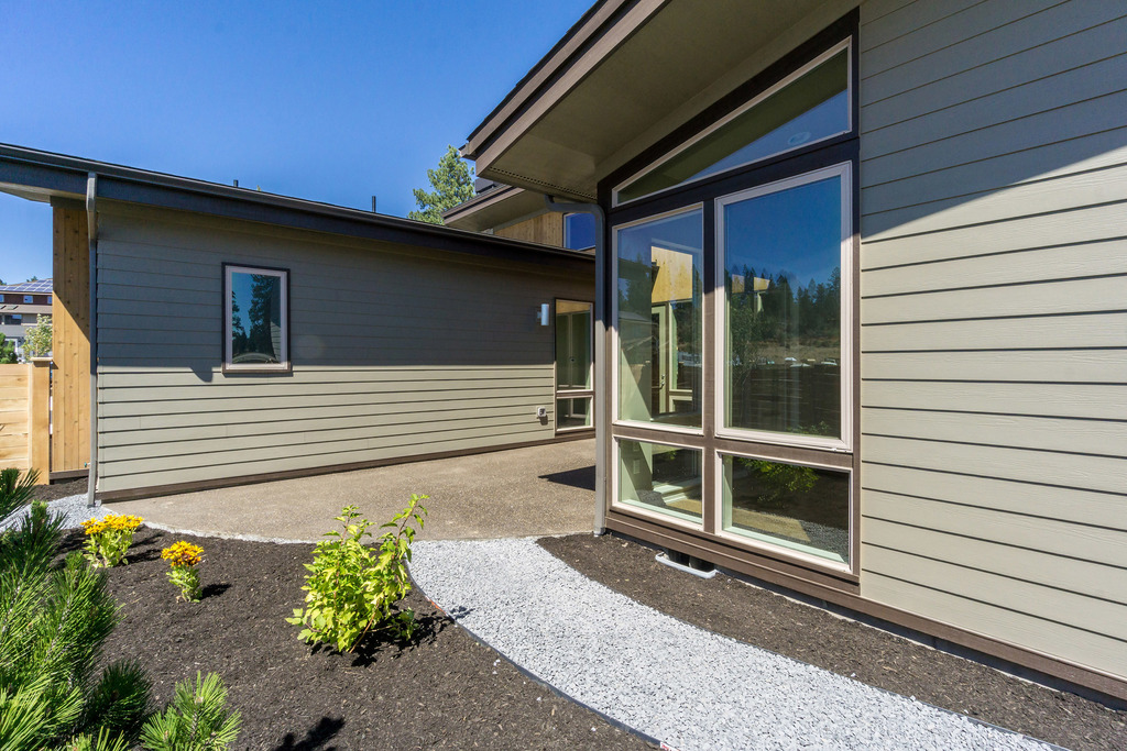 The view from a master bedroom to a courty-yard The view from a master bedroom to a courty-yard in ShelterStudio house plan
