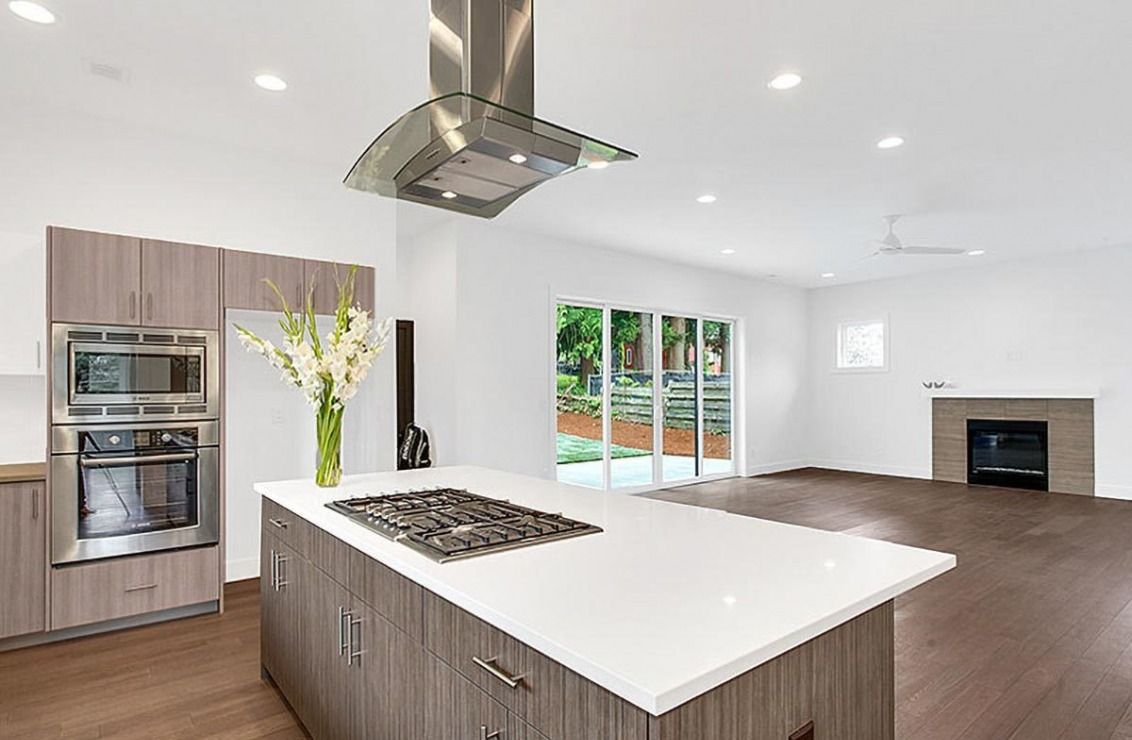Contemporary style hood over a gas stove