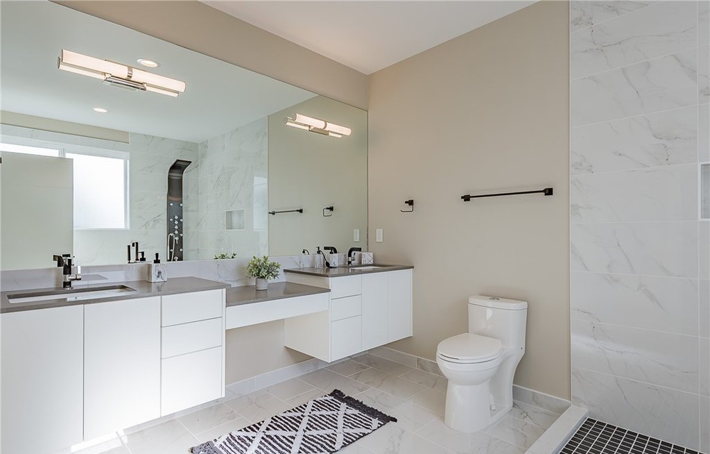 modern bathroom with large mirror