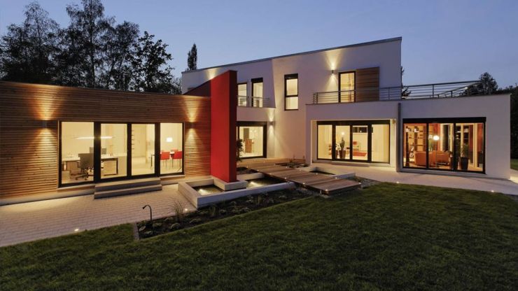 Modern two-story house plan with a garage, large office and two second floor decks. This house plan provides three bedroom and a large bathroom with a sauna.
